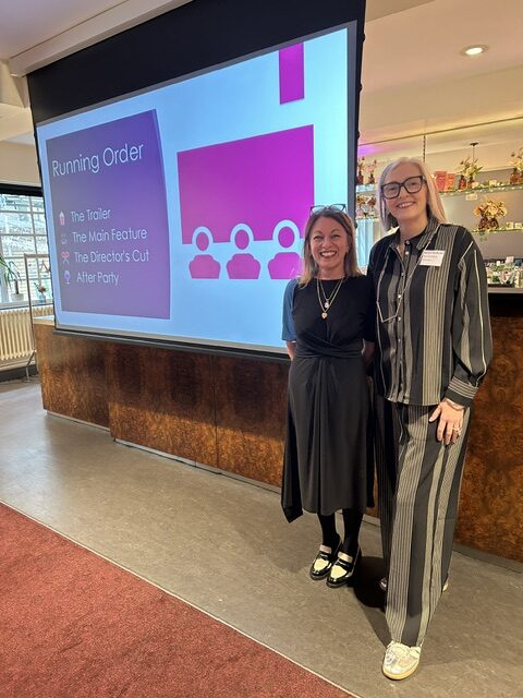 L and K Tyneside Cinema Lucy and Karen are two white women standing to the right hand side of a large projector screen at the Inclusion Forum North East.
